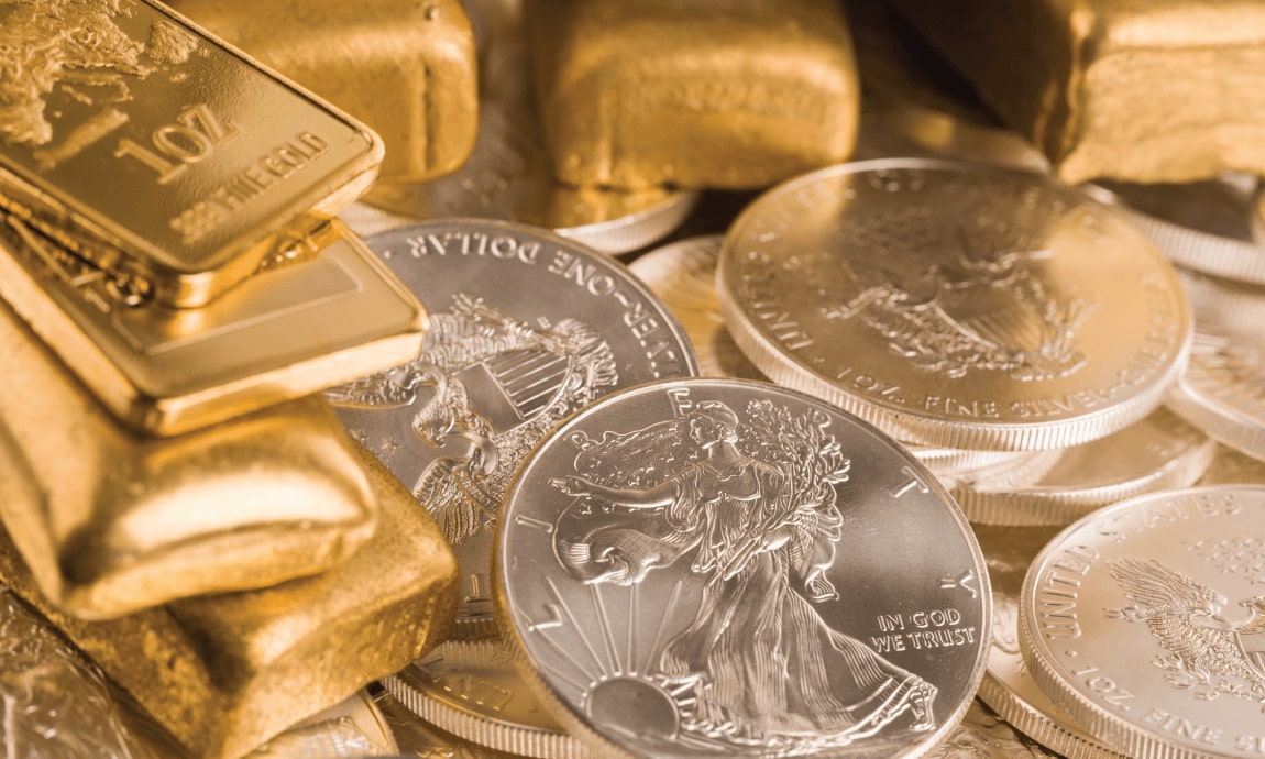 Gold and Silver sink to multi-week lows on higher rate expectations